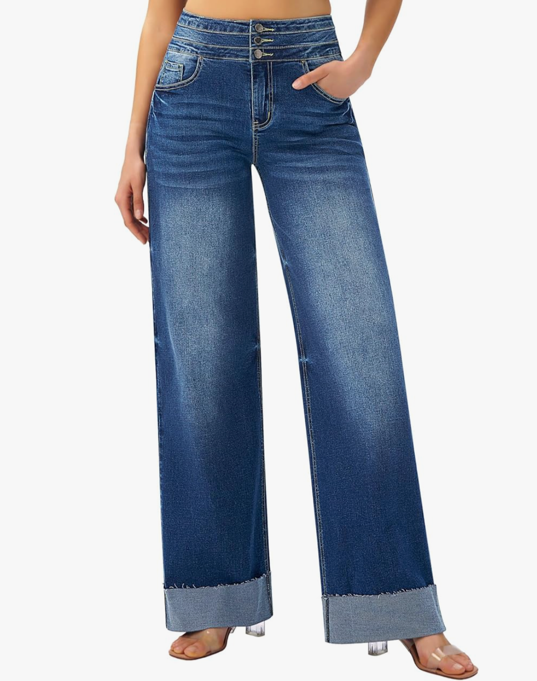 A woman wearing medium-wash wide-leg jeans with a raw hem, styled as a comfortable base for a casual blazer outfit.