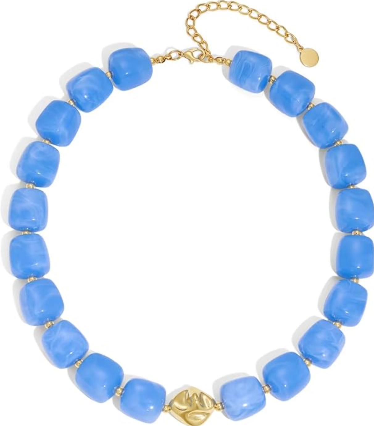 A close-up of a vibrant cobalt blue statement necklace featuring large, chunky square resin beads separated by small gold spacer beads, finished with a textured gold center charm and an adjustable gold chain clasp.