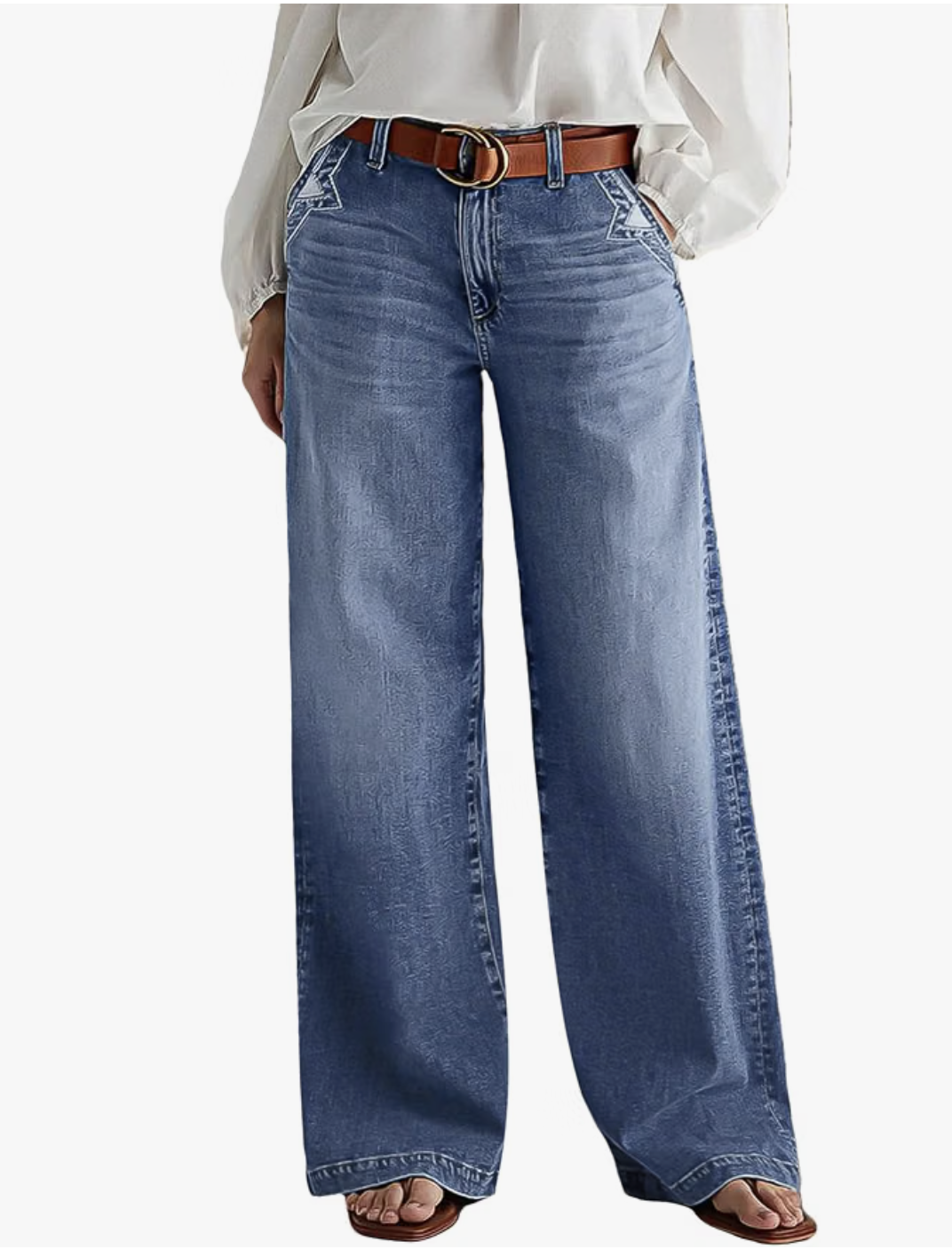 Woman wearing wide-leg tummy-control jeans from Amazon with a smooth waistband and relaxed leg.