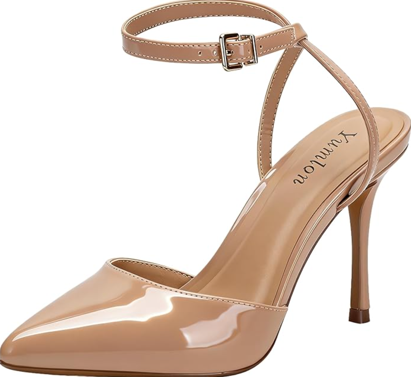 A pair of pointed-toe nude patent leather slingback heels with a delicate ankle strap and a tall stiletto heel, representing the sophisticated spring 2026 footwear trend.