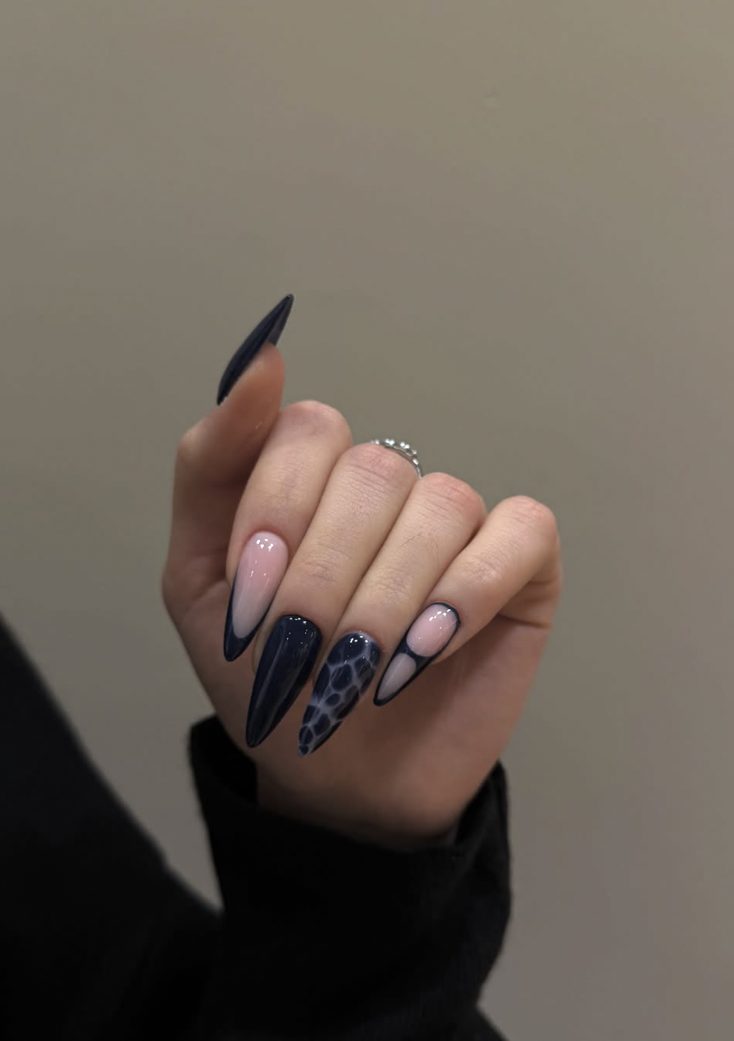 Deep navy blue glossy manicure on short square nails
