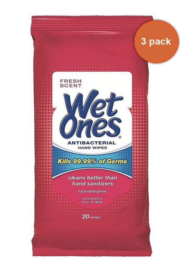 Travel pack of sanitizing wipes in an exterior bag pocket