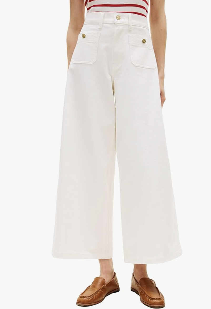 A pair of Tommy Hilfiger high-rise wide-leg jeans in optic white, featuring gold nautical-style button details on the front pockets and a tailored fit.