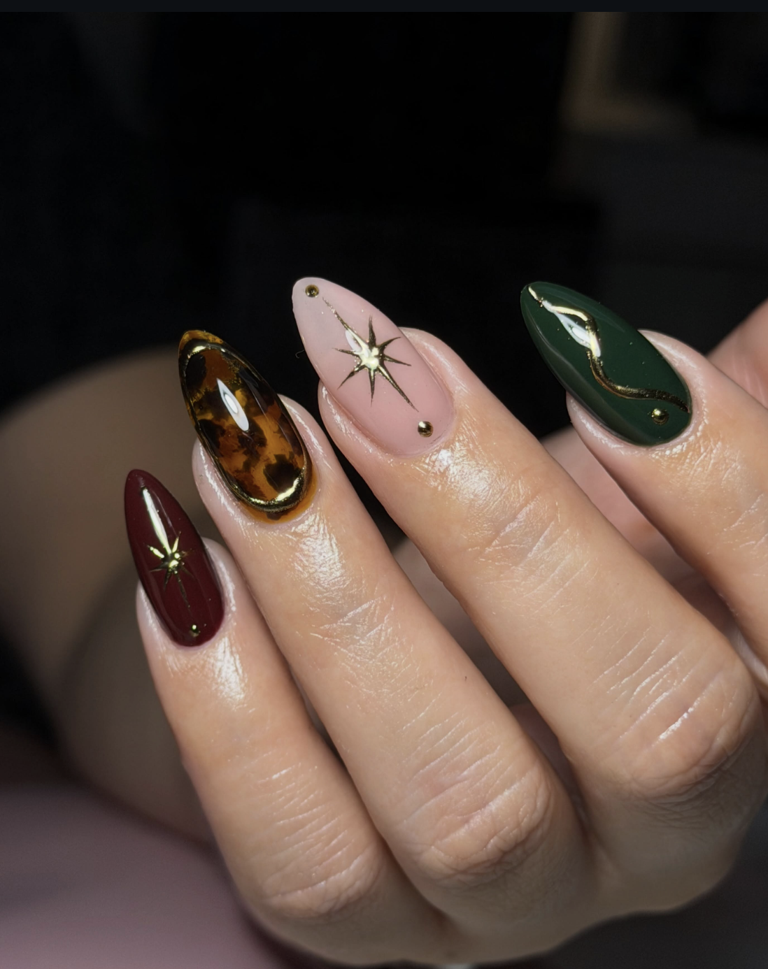 Dark celestial October nails with delicate moon and star details