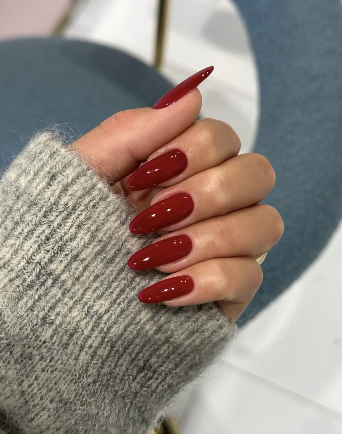 Classic glossy red Christmas nails with a glassy high-shine finish
