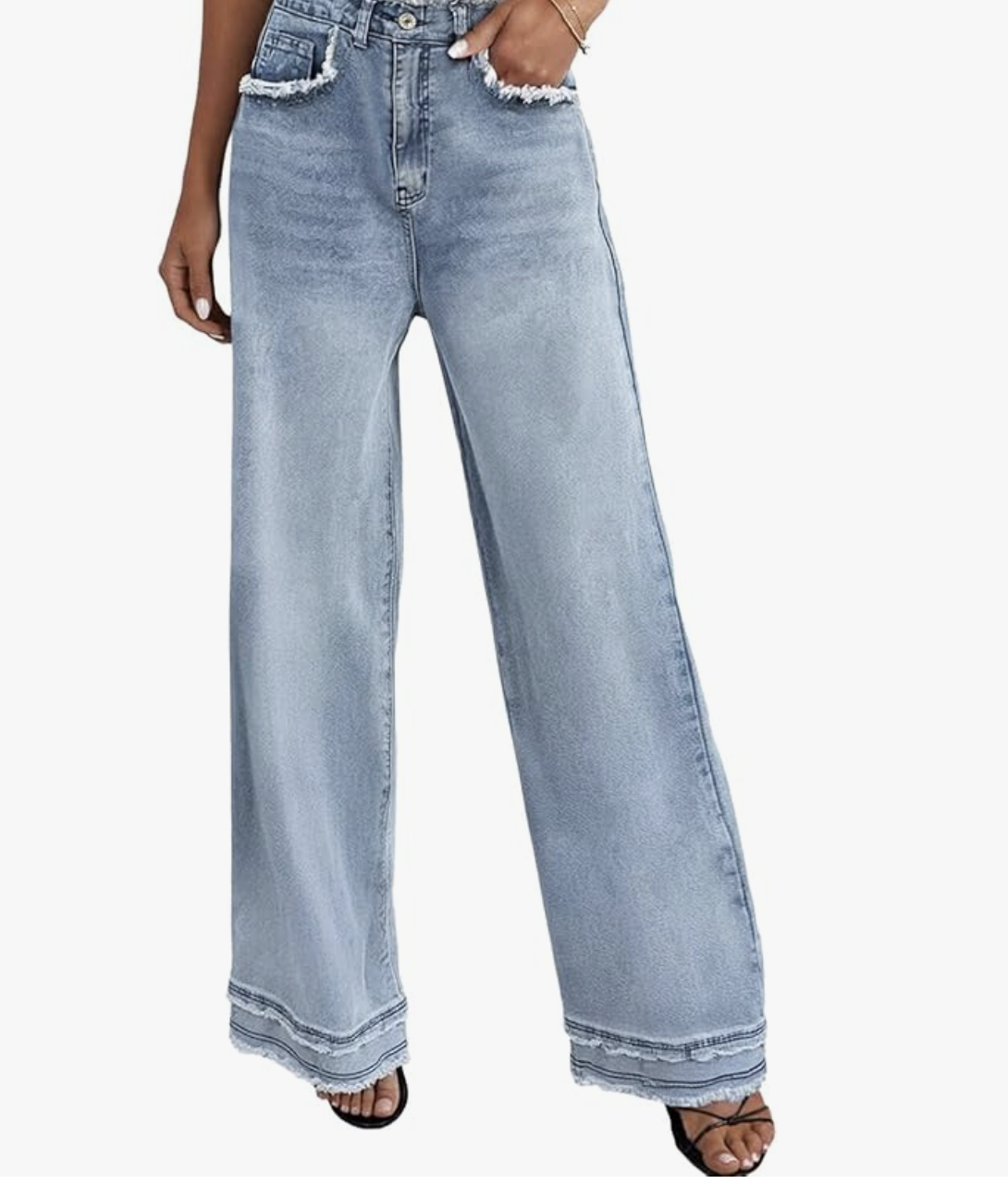 Model wearing LBDLONGBIDA Stretchy High Waisted Baggy Jeans in a light wash, showing the relaxed wide-leg fit and raw hem that provides room for muscular thighs on an athletic figure.