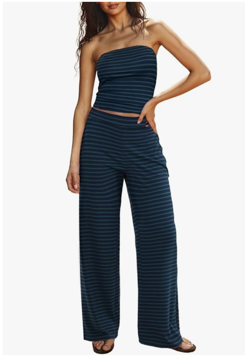 A woman wearing a coordinated two-piece set from Amazon featuring a navy blue and thin white horizontal striped tube top and matching high-waisted wide-leg palazzo pants.
