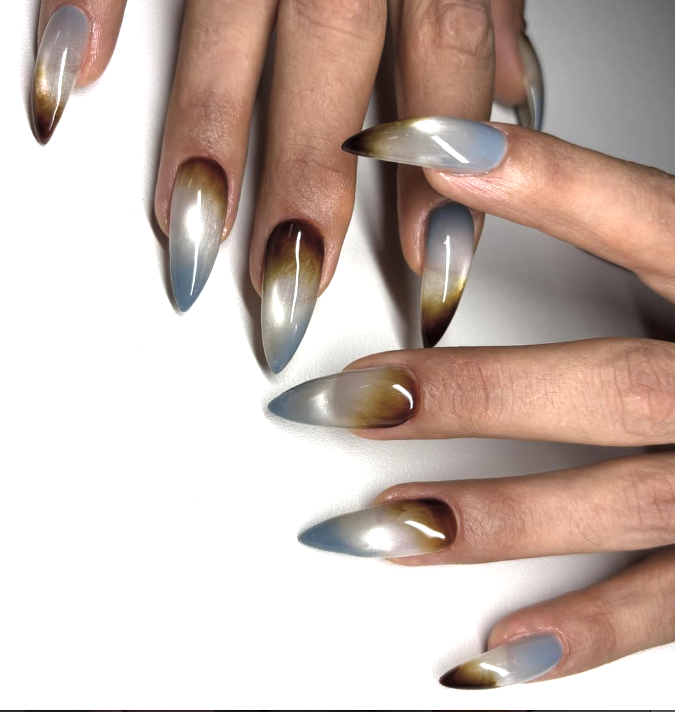 Mixed fall aura manicure in brown, burgundy, olive, rust and plum.