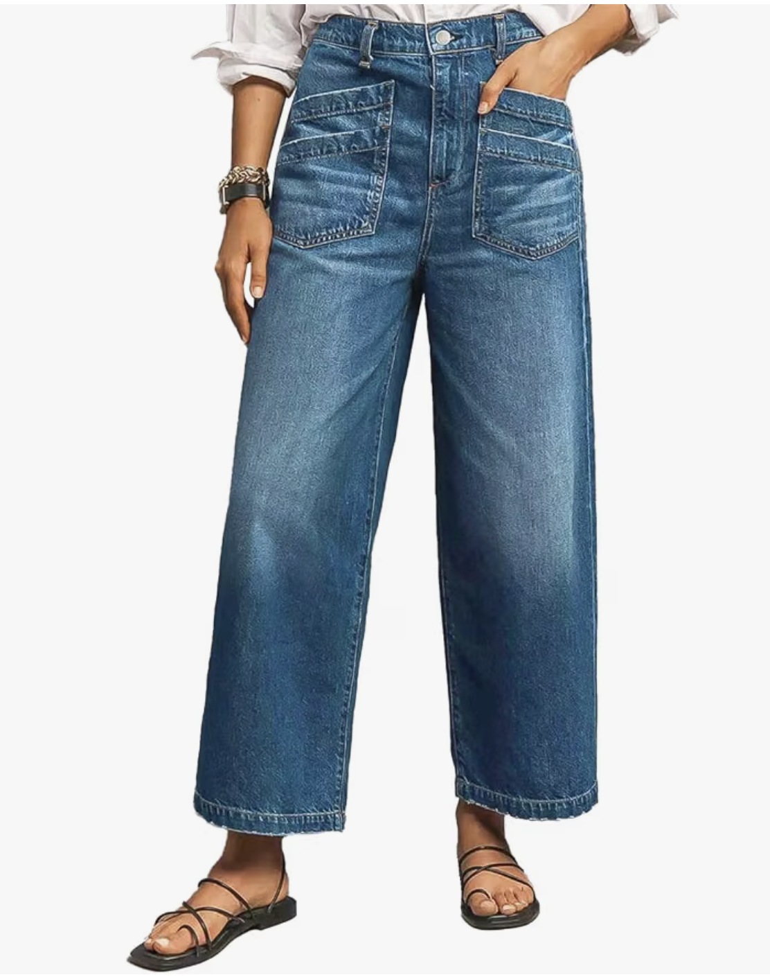 Woman wearing Flamingals mid-rise wide straight-leg jeans with a relaxed silhouette.