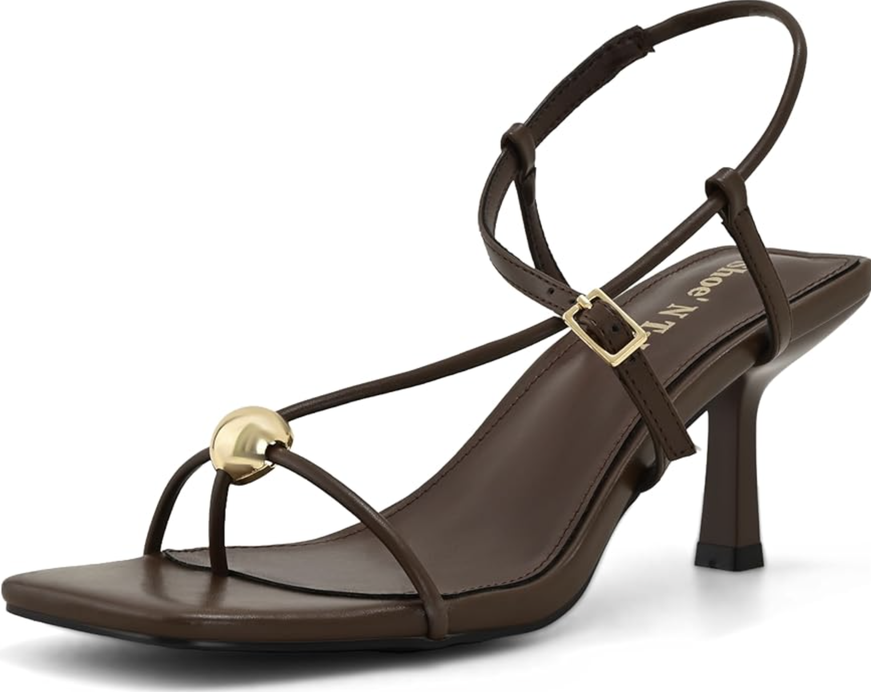 A pair of brown strappy kitten heel sandals with gold hardware from Amazon, styled to elongate the leg and complement a bodysuit and asymmetrical skirt outfit.