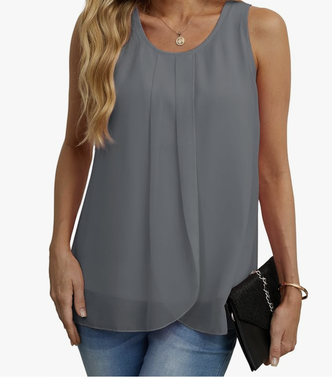 Close-up of a woman wearing a dark grey, sleeveless double-layer chiffon shell blouse with a relaxed round neckline, styled over blue denim jeans.