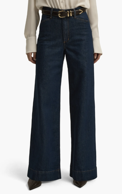 Product shot of Favorite Daughter The Mischa super high-waist wide-leg jeans in a dark wash, featured as a structured and polished take on the baggy jeans trend.