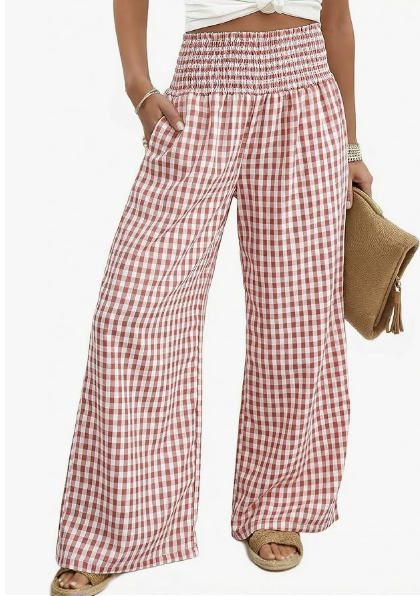 Fashion editor wearing a voluminous cherry red bubble maxi skirt with a fitted white top, demonstrating a 2026 romantic outfit formula.