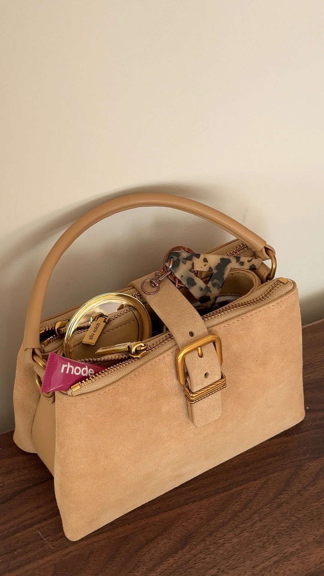 Organized everyday tote with small essentials in pouches