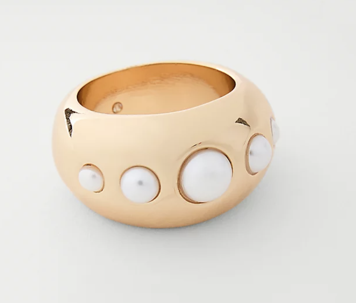 Professional stylist's pick: a sculptural gold-tone Ann Taylor Pearl Bubble Ring featuring inset pearls and a modern, high-polish chunky silhouette.