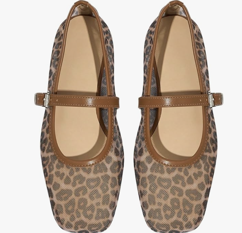 A pair of leopard print mesh ballet flats with a pointed toe and brown leather trim, shown as a polished shoe option for what to wear with a spaghetti strap dress.