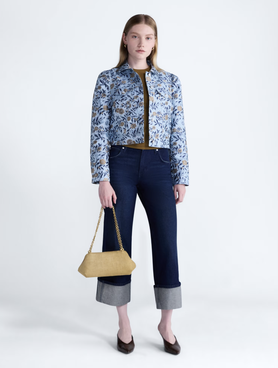 Cropped Scoop denim trucker jacket with puff sleeves.