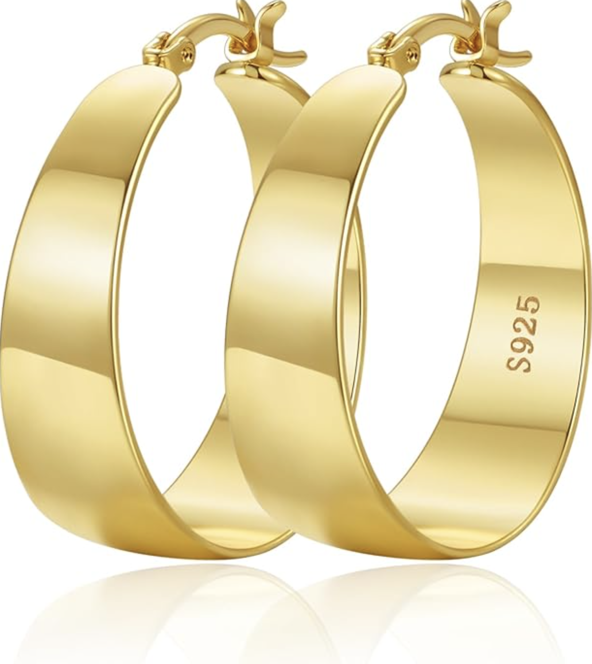A pair of thick 10mm chunky gold hoop earrings with a high-polish finish and a secure latch-back closure, styled as a face-framing accessory for a women’s spring capsule wardrobe.