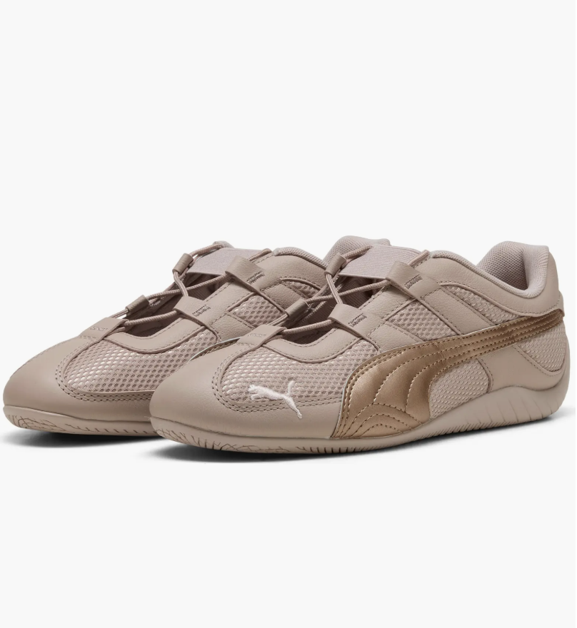 A pair of tan PUMA Speedcat Go Mesh sneakers with a low-profile silhouette and white PUMA logo, representing the slim-sole trainer trend for Spring 2026.