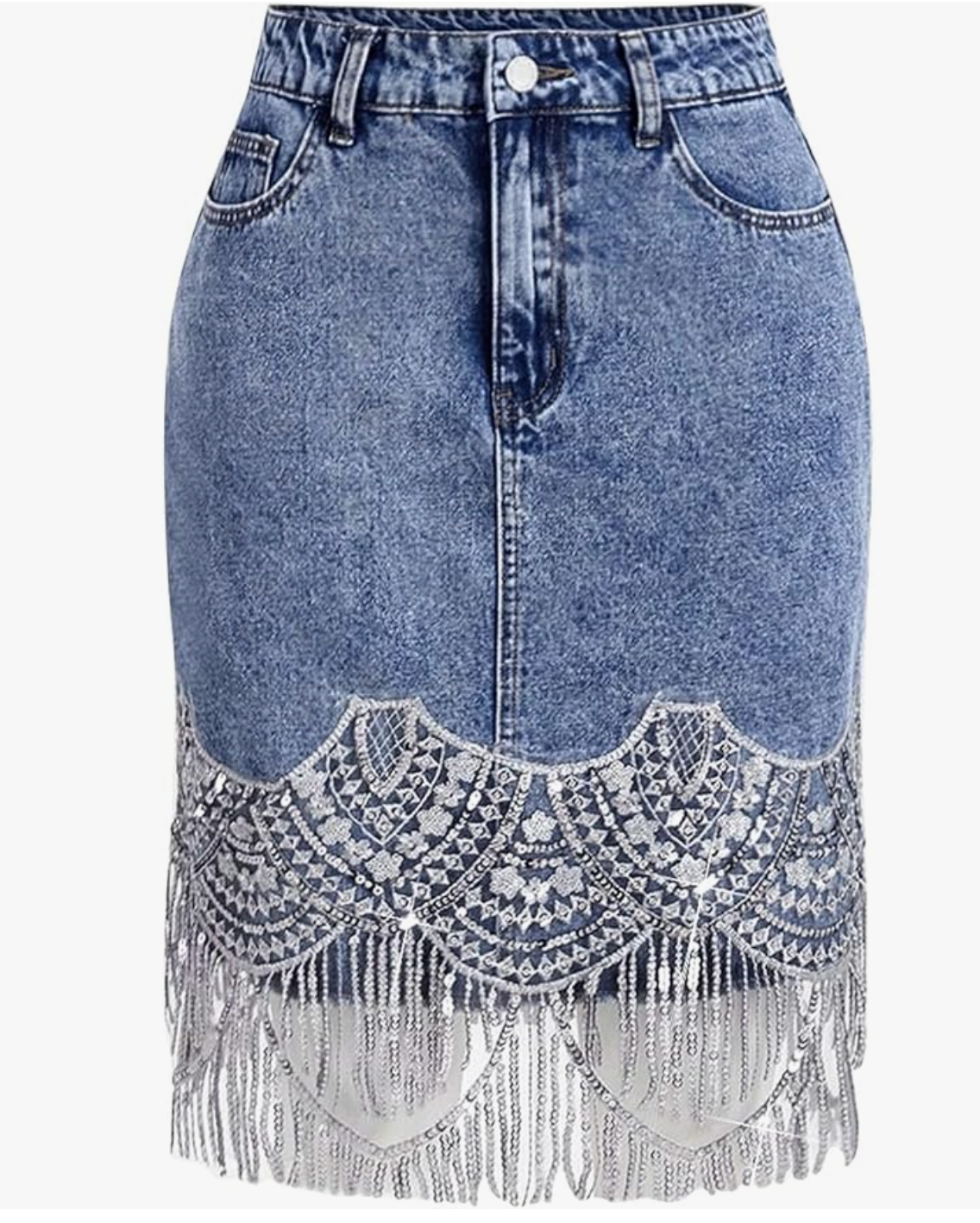 A close-up of a medium-wash denim midi skirt featuring an intricate white lace and sequin patchwork inlay along the hem with silver fringe trim.
