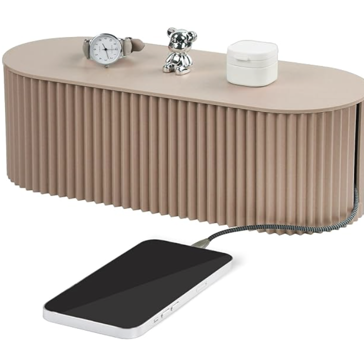 Cable-management box concealing a power strip and cords