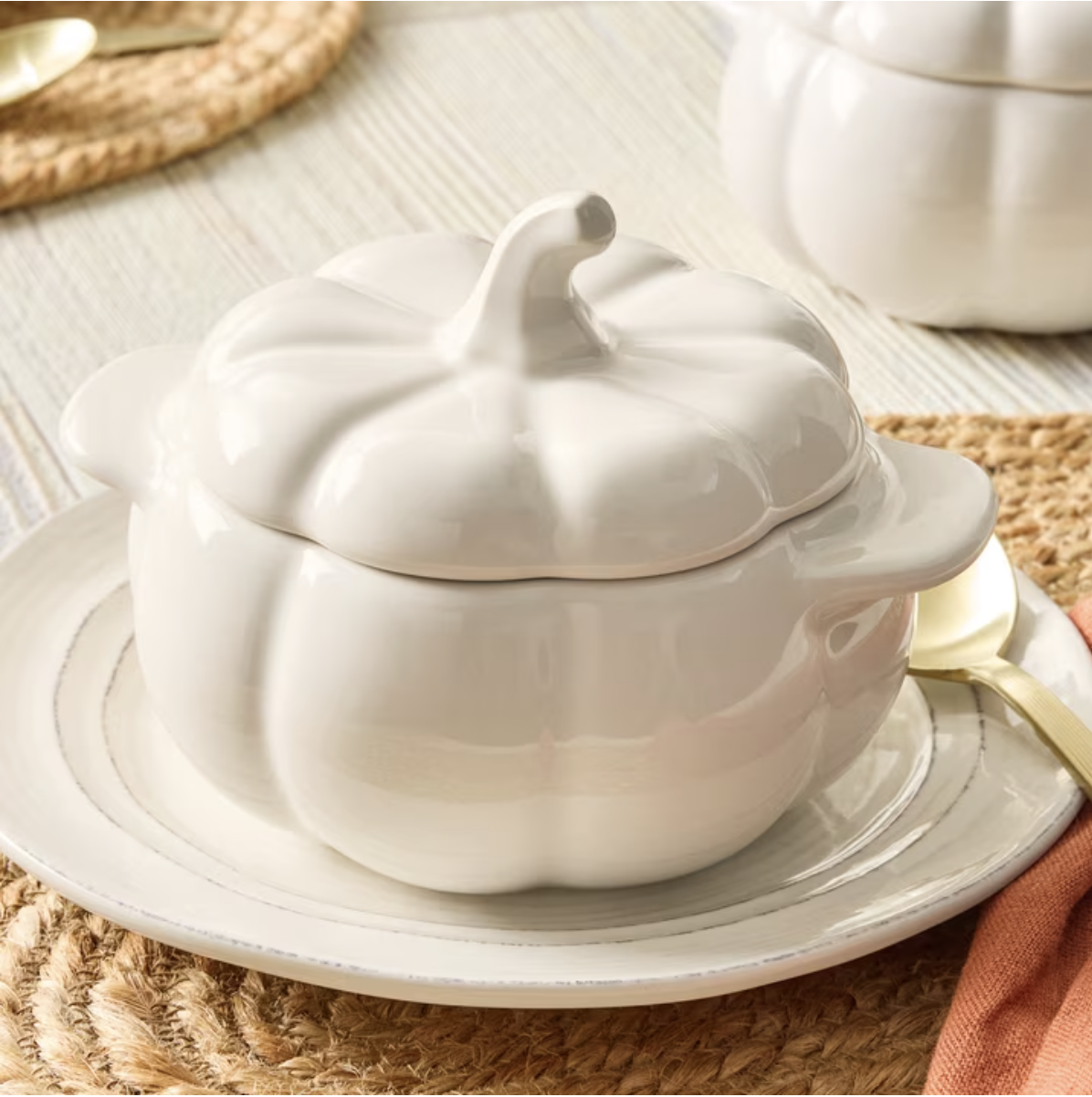 Friendsgiving buffet with serving platters, bowls and dishes arranged at different heights