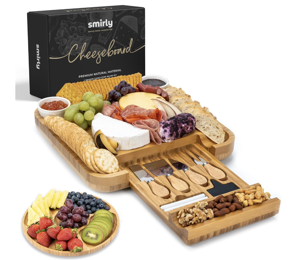 SMIRLY bamboo charcuterie board set displayed with cheese, crackers, meats, and fruit alongside its included accessories and product box.
