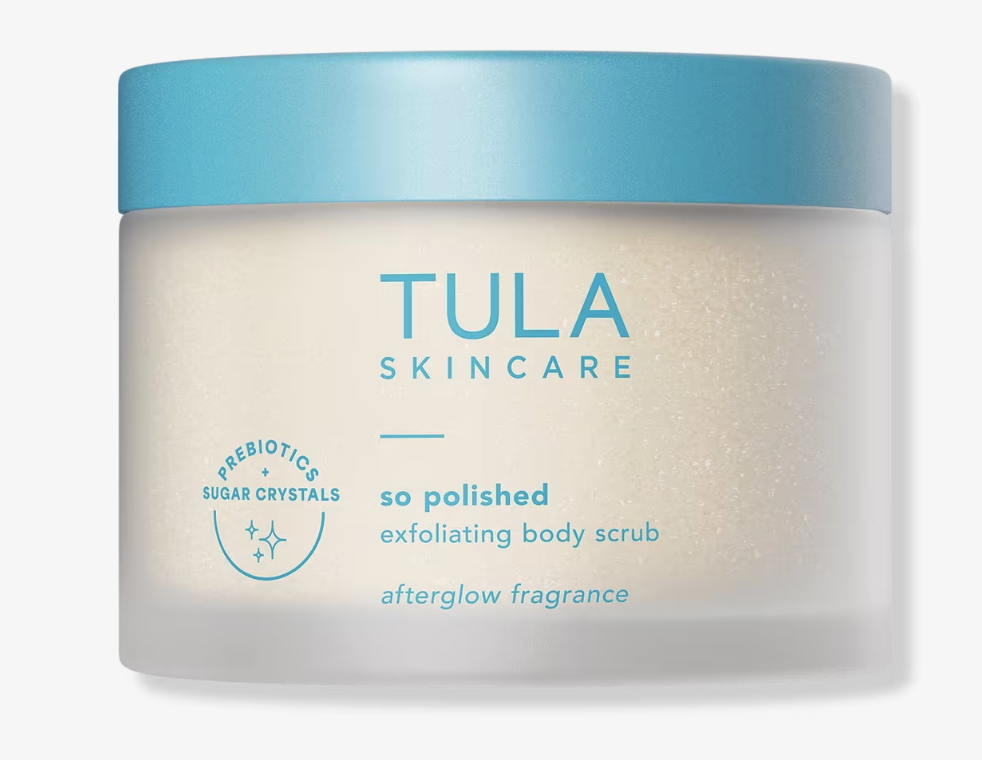 Tula Skincare So Polished Exfoliating Body Scrub in a light blue and white tub featuring prebiotic sugar crystals and a fresh afterglow fragrance.