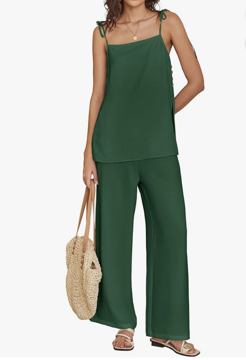 A chic forest green two-piece women's matching lounge set featuring a sleeveless top with side button details and fluid, wide-leg pants.
