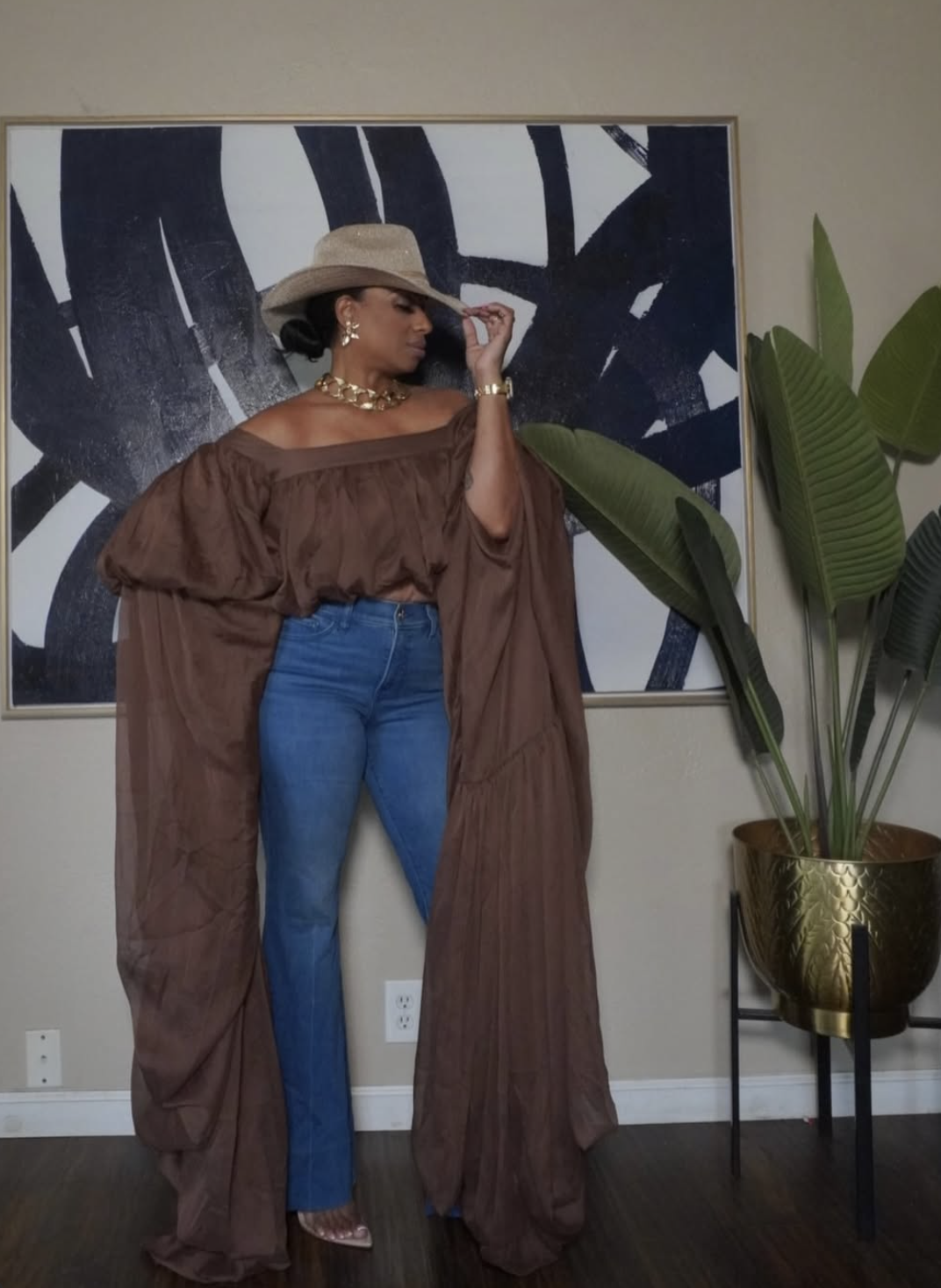 Full-length country concert outfit with wide leg jeans off shoulder top