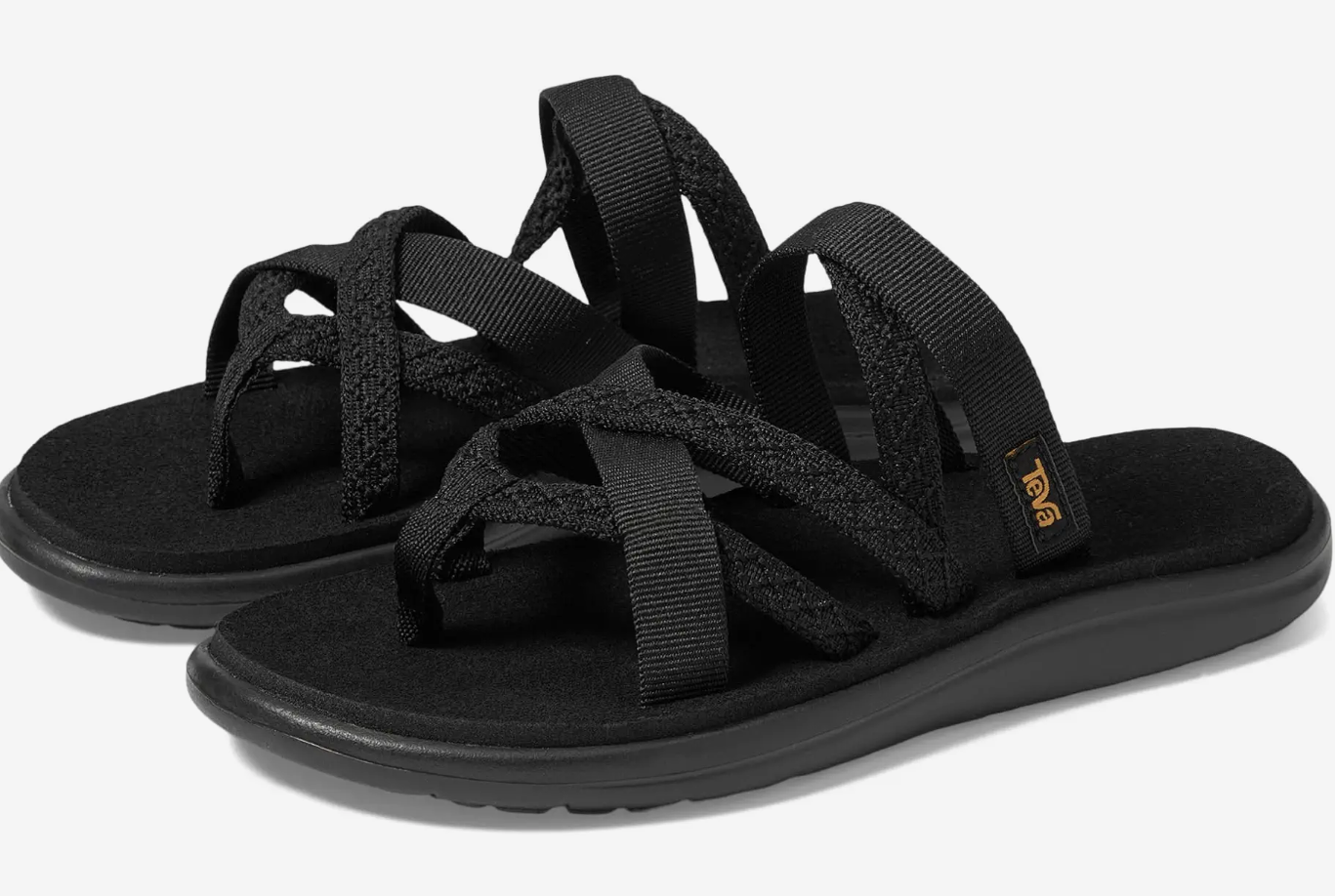 Teva Women's Voya Zillesa in Mahani Black featuring a crossing-strap layout, Mush™ topsole cushioning, and a lightweight EVA foam outsole for 10,000-step comfort.