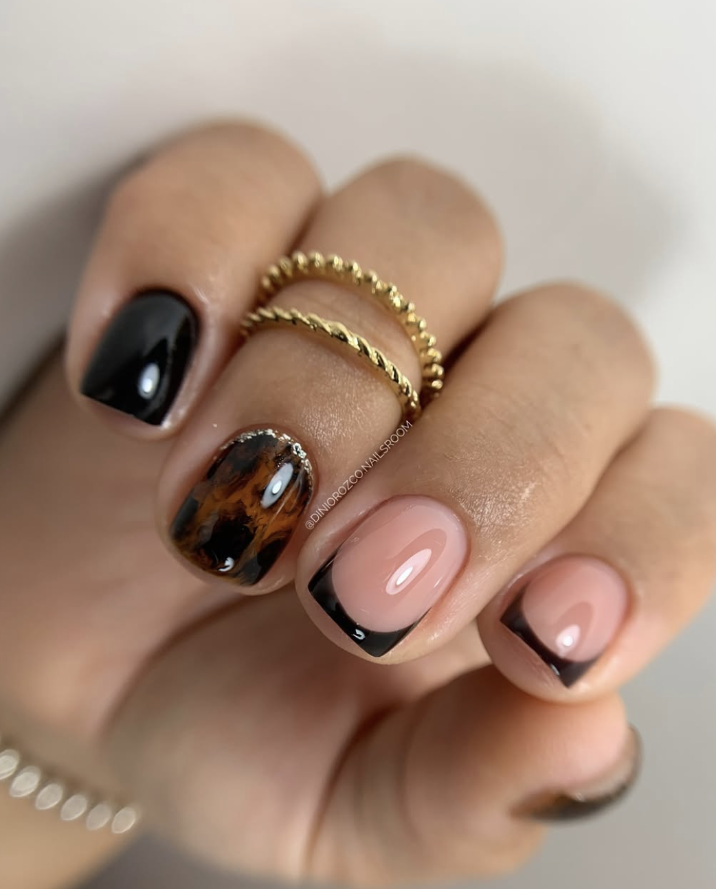 Cute brown tortoiseshell accents for a back-to-school manicure