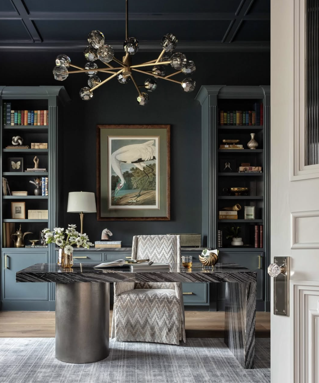 Heirloom-style vintage mirror and framed art as a bedroom decor accent