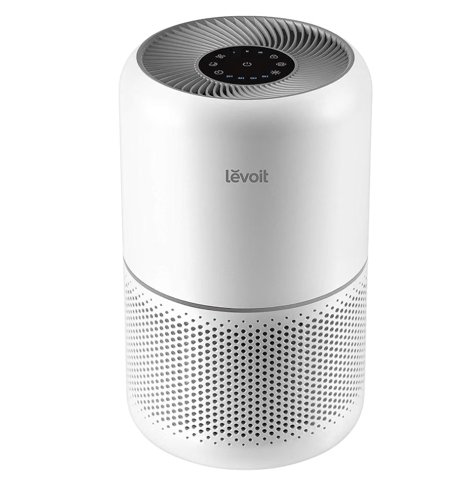 Levoit Core 300-P air purifier in white, shown in a bedroom corner