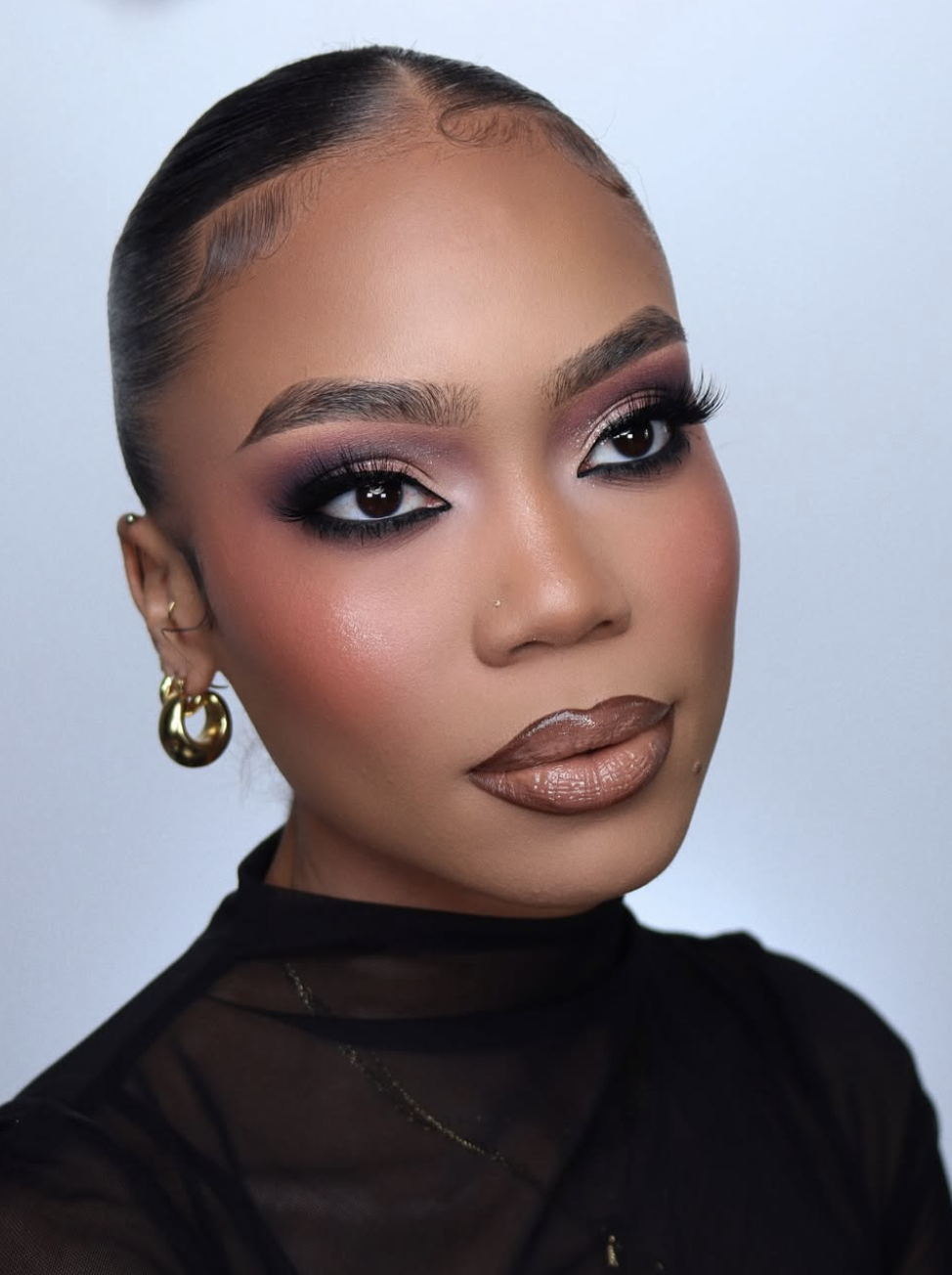Strategic cream highlight on cheekbones and inner eye corners