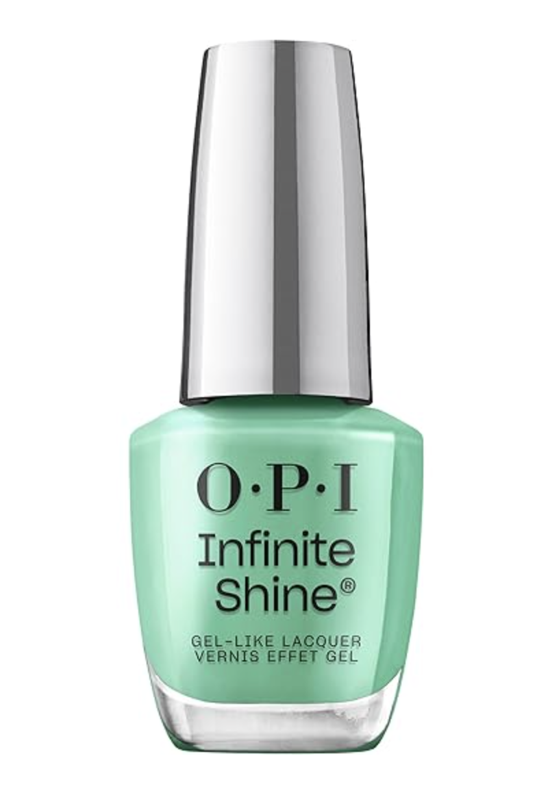A bottle of OPI Infinite Shine "Big Apple Green," a vibrant, high-shine grass green nail polish from the 2026 OPIcons collection.