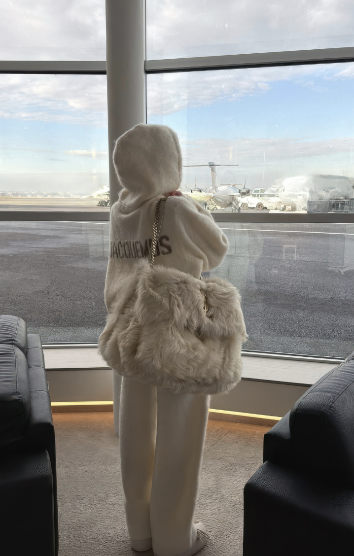 A cream hooded set with a textured tote.