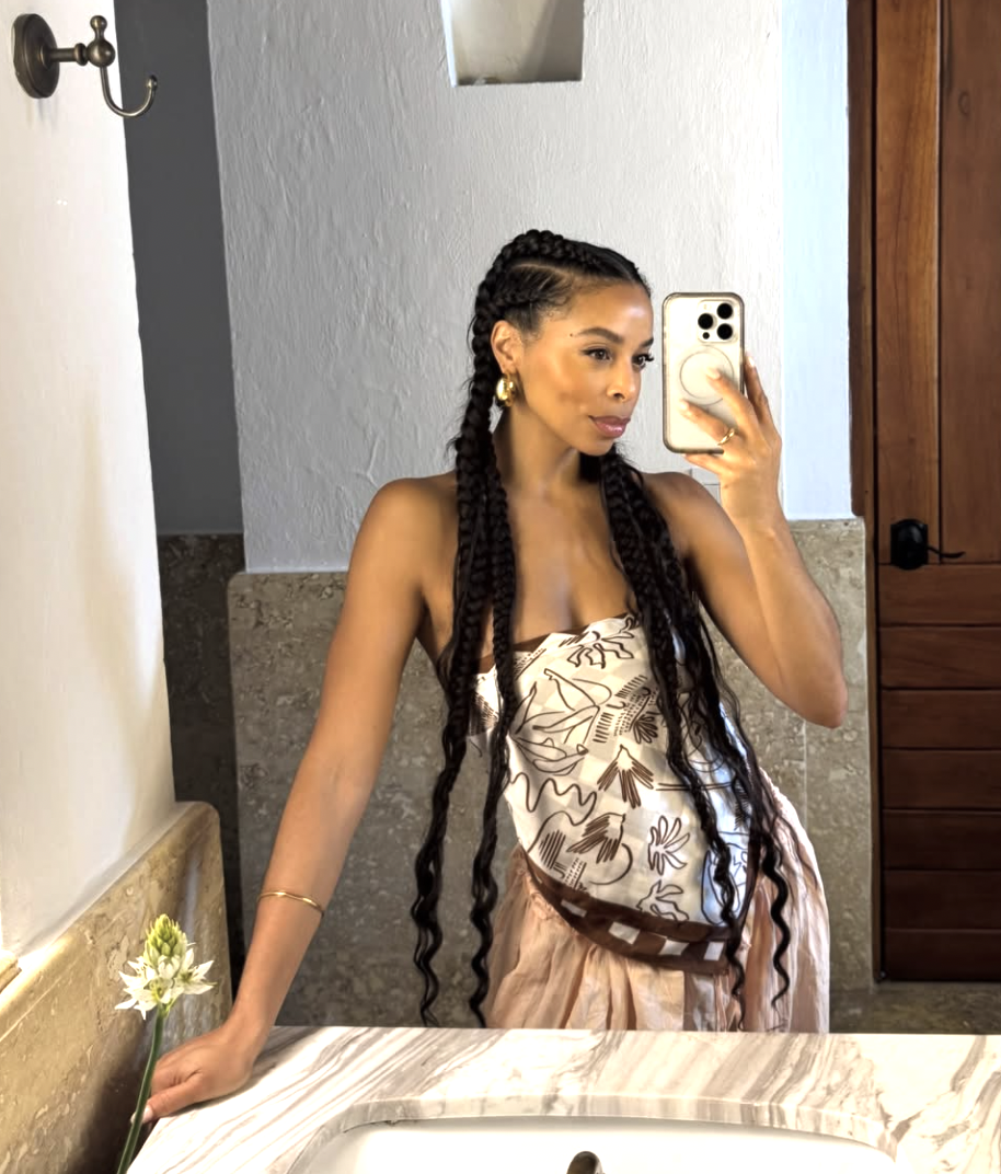 Three pairs of dainty gold huggie hoop earrings in varying sizes, a versatile spring 2026 jewelry essential for everyday wear.