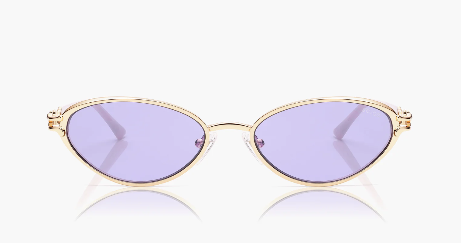A pair of oval sunglasses with a slim gold metal frame and light purple gradient lenses, shown from a front-facing perspective against a white background.
