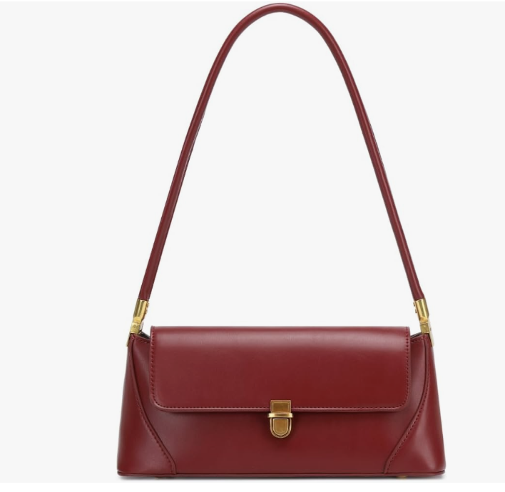 Sleek cherry red leather shoulder bag with a gold clasp, a timeless accessory for a 2026 bold color trend outfit formula.