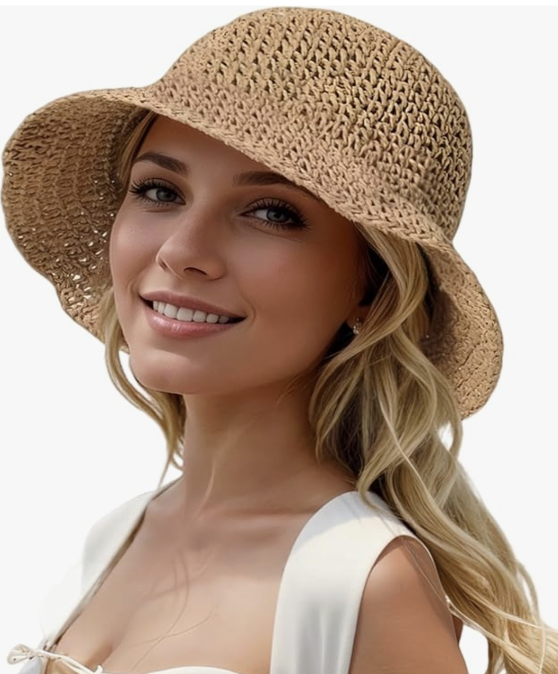 A woman wearing a tan straw beach sun hat, styled as a functional and chic accessory for a summer BBQ outfit.