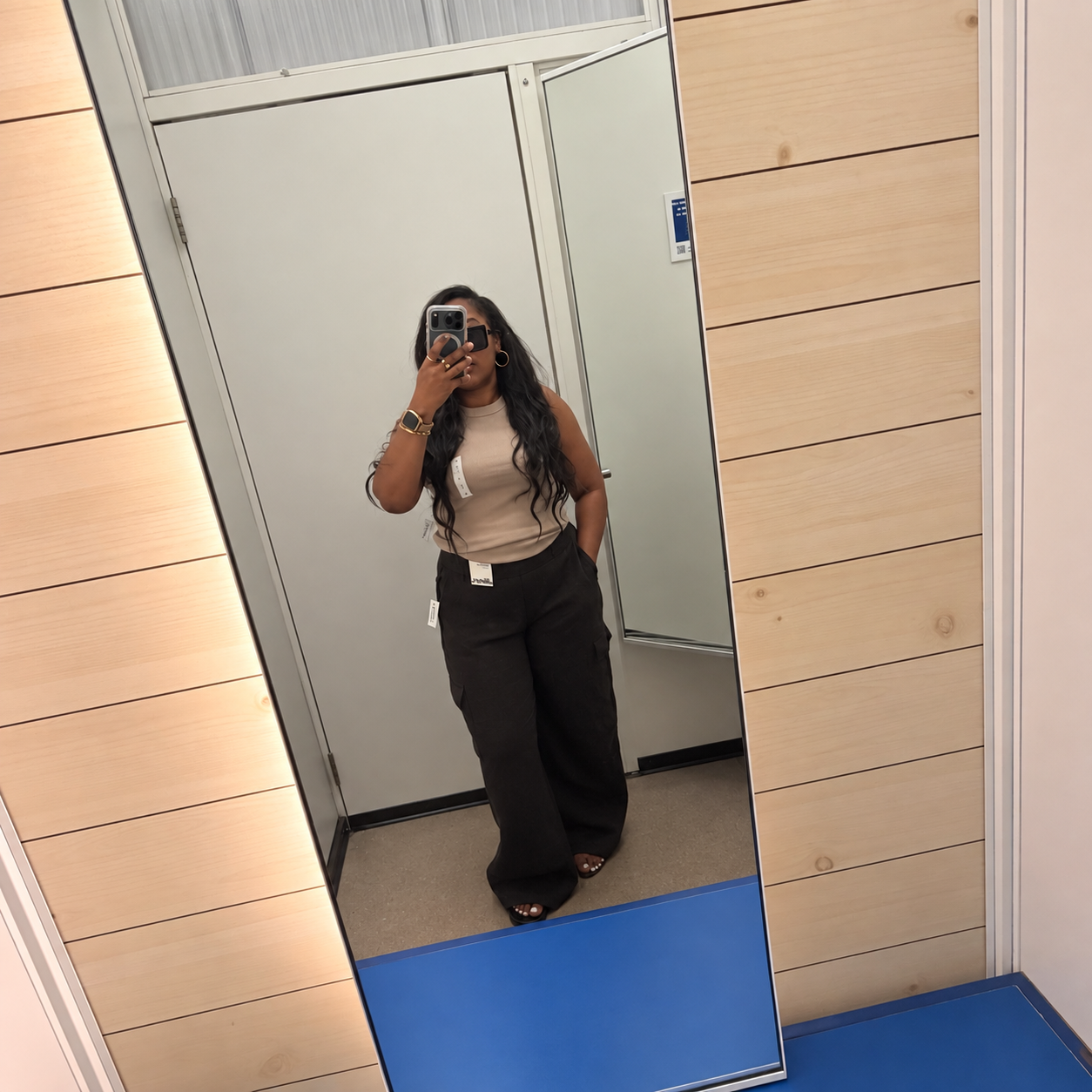 Old Navy High-Waisted Bounce Fleece Wide-Leg Cargo Sweatpants in chocolate brown, studio product photo, priced at $34.99.