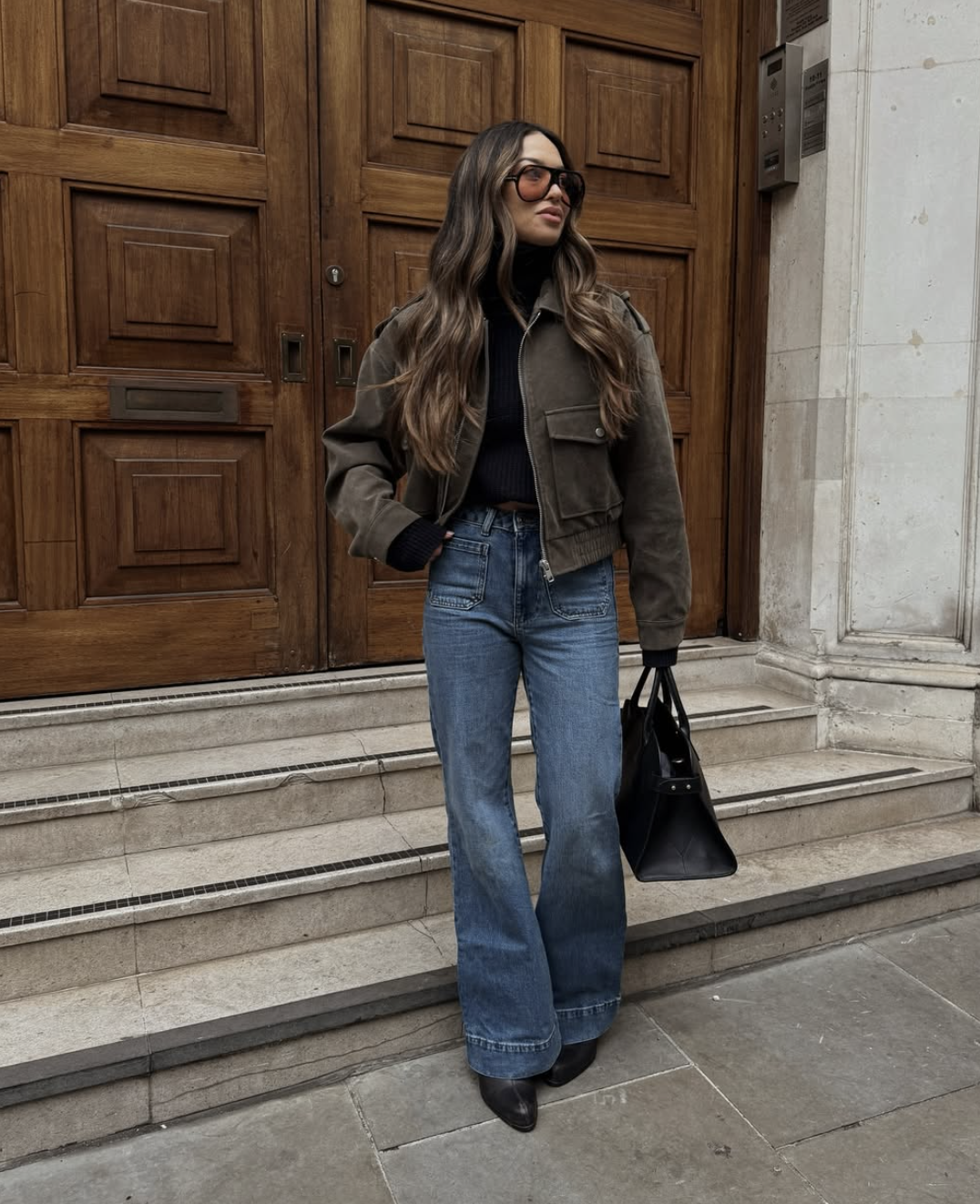 Curvy: contoured-waist flare jeans styled for fall, featured in an Autum Love guide
