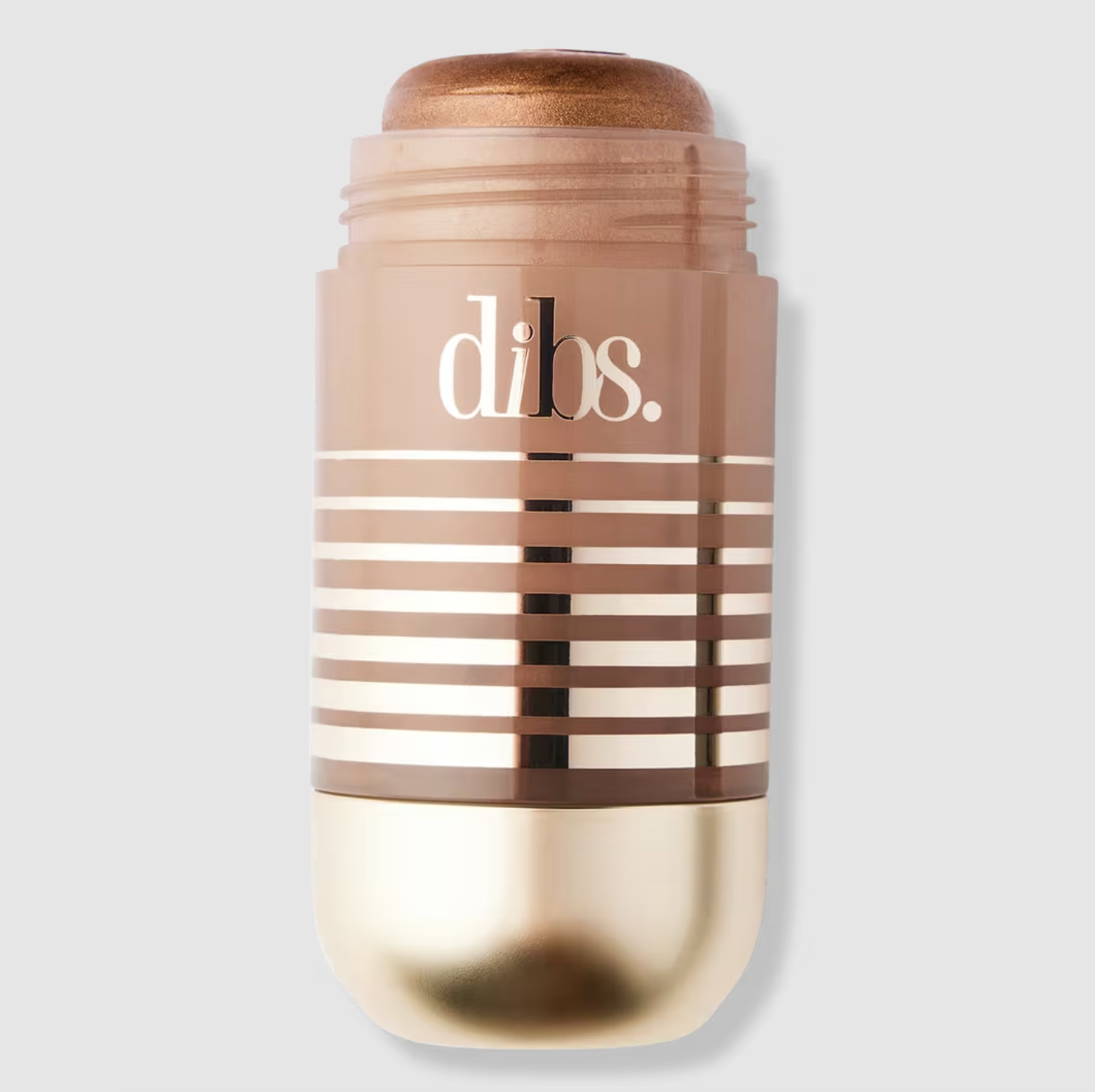 A product shot of the [DIBS Beauty Status Stick Face-And-Body Highlighter](https://bit.ly/4065Ww2), a champagne-gold cream highlighter used for a makeup under foundation hack to achieve a 2026 glass skin glow.