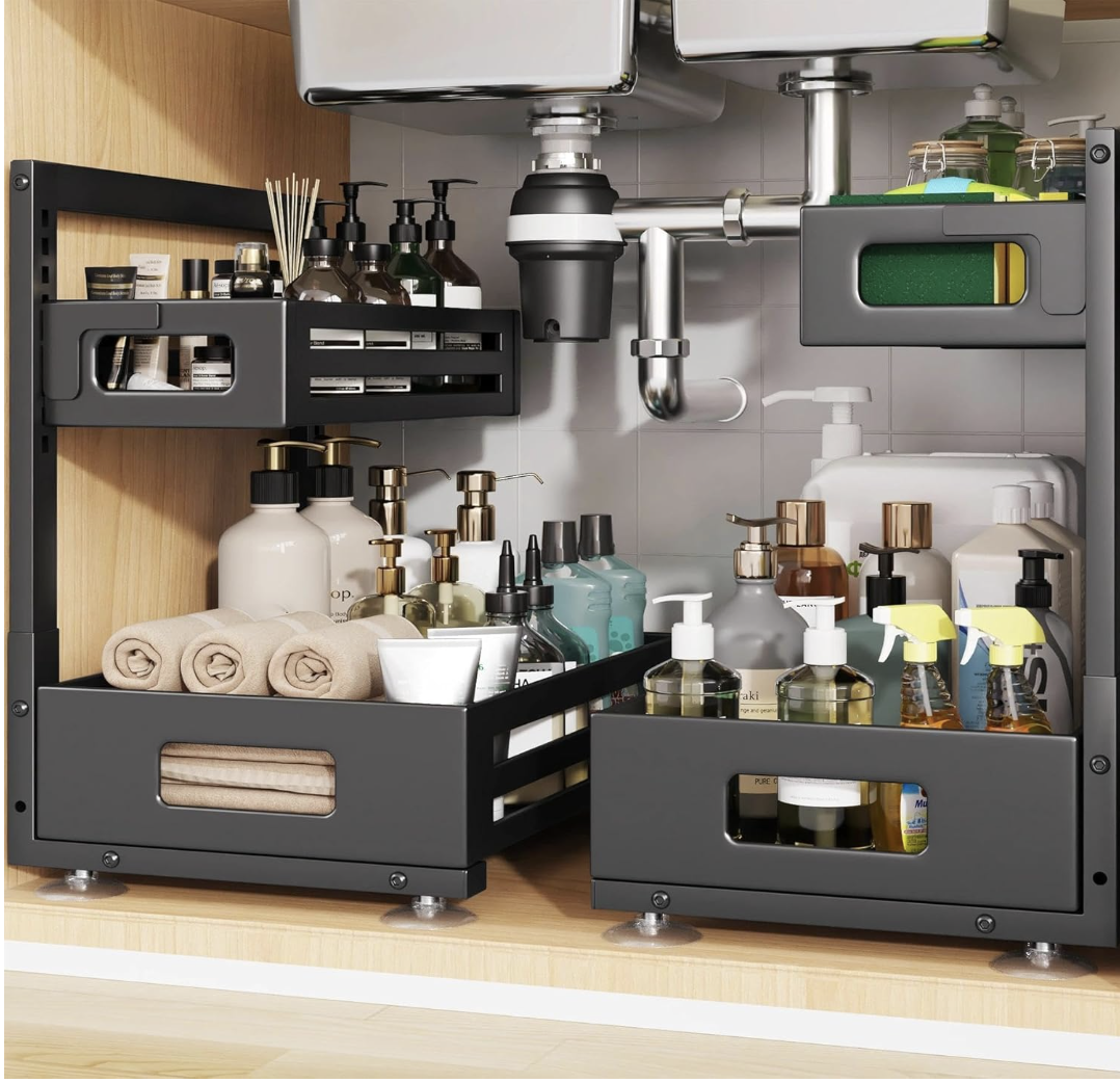 Pullout drawers organizing cleaning products beneath a sink