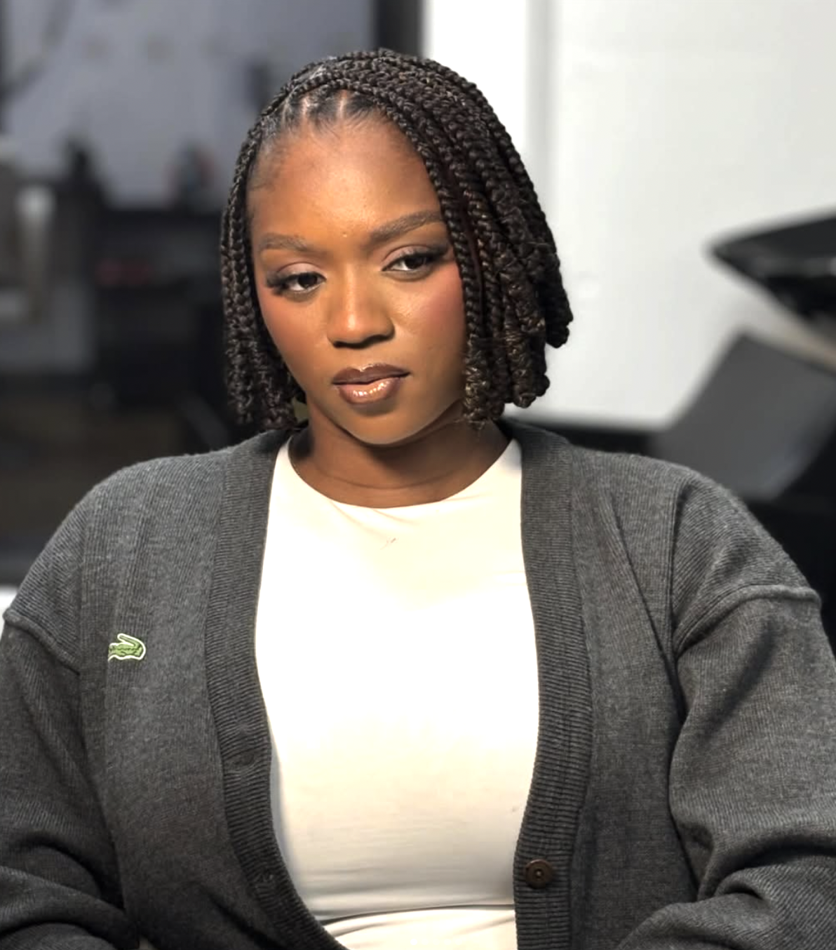 Bob braids with defined curls concentrated at the ends.