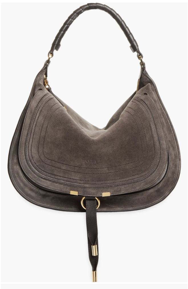 A dark grey leather shoulder bag featuring a silver metal ring accent and a black hanging strap detail.