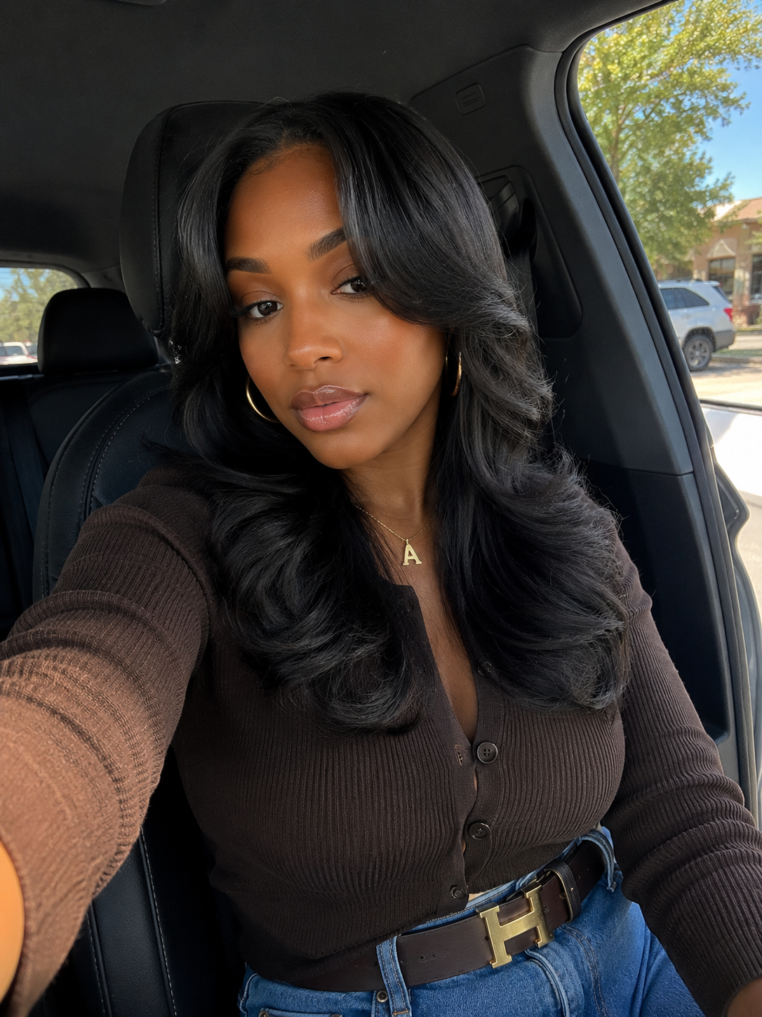 Bouncy heatless curls styled on a silk press