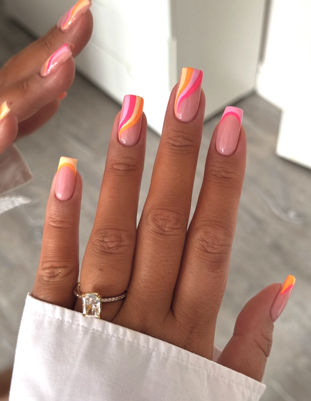 French manicure with two-tone hot-pink and orange tips