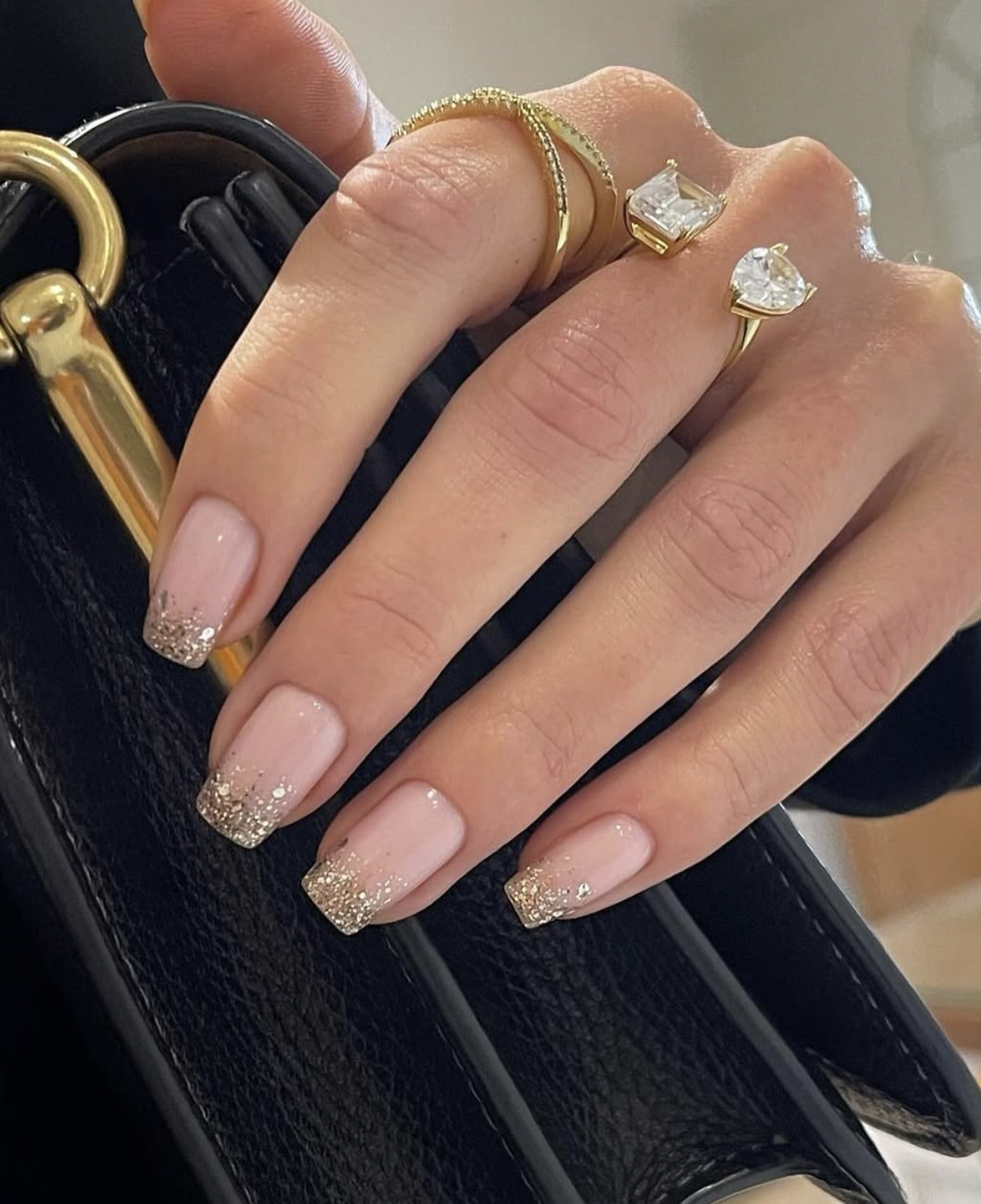 Champagne glitter Christmas nails with a soft gradient over a sheer base